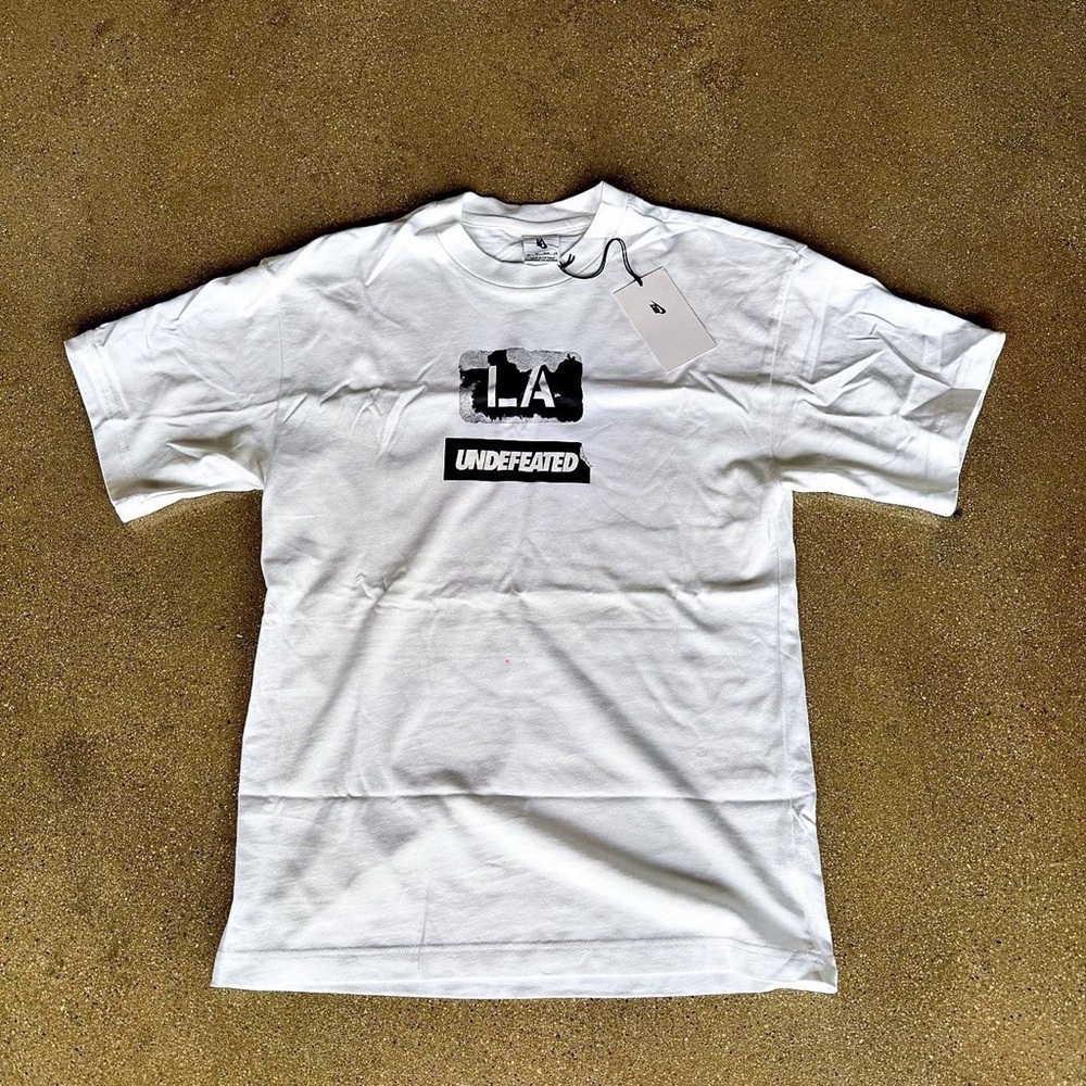 Nike White Short Sleeve Graphic T-Shirt with Black LA Undefeated Print